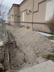 A trench for utilities along the south side of the original building. - , Utah