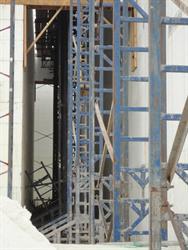 Scaffolding fills a future hallway near the north end of the west exterior wall. - , Utah