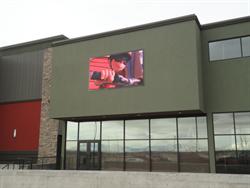A video display above the lobby windows shows a scene from "The Lorax." - , Utah