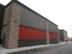 A red and gray color scheme, with decorative stone corners. - , Utah