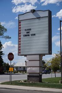The Carmike Cinemas logo has been painted white on the attaction board along Redwood Road. - , Utah