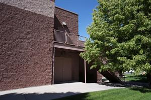 A second-level exit for the projection booth, above the exit doors for the main hallway. - , Utah