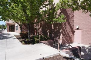 Sidewalk and stairs along the right side of the theater entrance. - , Utah