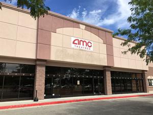 A temporary banner for AMC Theatres replaces the Carmike Cinemas sign above the theater entrance. - , Utah