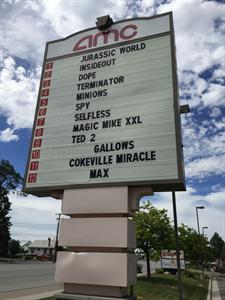 The AMC logo now displays above the attraction board along Redwood Road. - , Utah