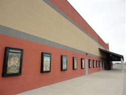 Poster cases along the west wall of the theater. - , Utah
