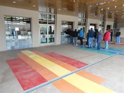 Moviegoers line up at one of the theater's ticket windows. - , Utah