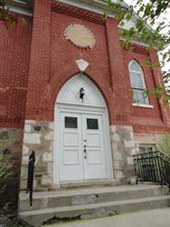 The front door of the former chapel is marked as an entrance for cast only. - , Utah