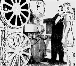 'Manager Robert Pedersen shows candy girl Terri Lym projection machine at new Valley Fair 4 Cinemas.' - , Utah