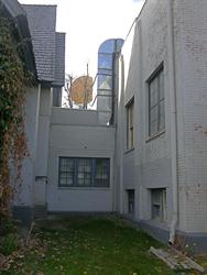 Above the addition that connects the buildings is a large ventilation duct and a satelitte dish. - , Utah
