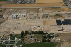Aerial photo of The District development with half of the walls up for the theater complex. - , Utah