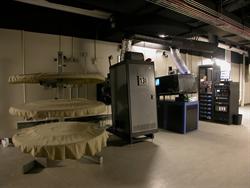 A 35mm projector stands next to a digital projector, both for Theater 13. - , Utah