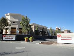 Banners on construction fences indicate the temporary entrance for the new Cinemark Farmington. - , Utah