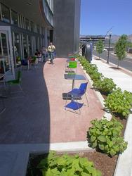 On the east side of the theater is outside seating for the food court. - , Utah