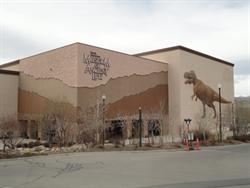 The Mammoth Screen Theatre is the section of the building on the right, with a tyrannosaurus rex on the exterior wall. - , Utah