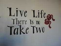 On the west wall of the lobby is the saying, 'Live life. There is no take two.' - , Utah