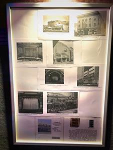 A poster case by the Cinedome projector is filled with photos of former theaters from the Ogden area. - , Utah
