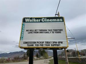 On the marquee of the Walker Cinemas during the COVID-19 closure: "We will get throiugh this together.  Love from our family to yours.  Concession pickup today 3 PM - 6 PM.  Thank you for your support." - , Utah