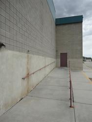 A ramp along the west wall of the new addition, leading to the exit door from one of the original auditoriums. - , Utah