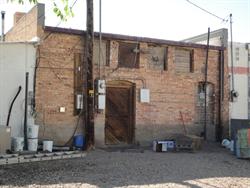 The rear wall has two exit doors, one of which has been bricked up. - , Utah