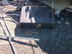A surround speaker lies in the rubble. - , Utah