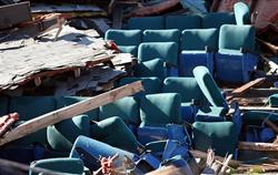 Six rows of blue seats, surrounded by wooden beams, shingles, and insulation. - , Utah