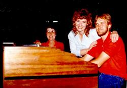 Blane Frederik at the organ console with Lisa Hill standing next to him and Nancy Tullis on the left.

 - , Utah