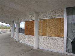 Plywood replaces windows in the ticket office. - , Utah