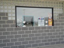 Two ticket windows in a diagonal wall at the corner of the building. - , Utah