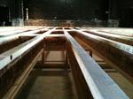 Looking across the new floor joists at the south wall of the auditorium. - , Utah