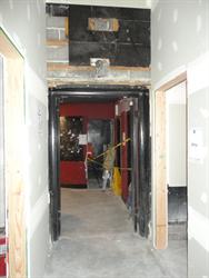 Looking through the old auditorium doors into the lobby.  Office space was built at the back of the original auditorium, so a hallway was built to connect to the new auditorium. - , Utah