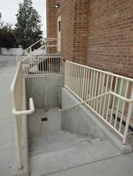 Stairs and railings to a lower level exit. - , Utah