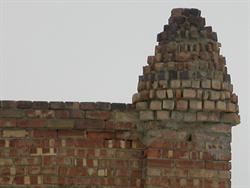 A beehive or pyramid shape at the southeast corner of the two-story section of the building. - , Utah