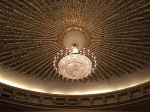 The chandelier hangs from white spere resembling a golf ball. - , Utah