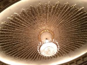 Gilded icicles radiate outward from the chandelier in a circle. - , Utah