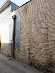 A bricked-up doorway near the end of the original building. - , Utah