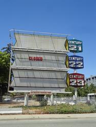 The word "Closed" appears on the sign for the Century 21, Century 22, and Century 23 buildings in San Jose.  In Salt Lake, each auditorium was given a number from 21 to 25.  In San Jose, each building retained its number, despite the addition of auditoriums. - , Utah