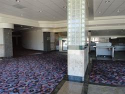  The left side of the lobby, with a curved hallway leading to the auditorium doors. - , Utah