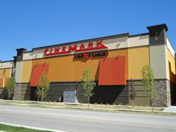 Cinemark and NextGen signs on the south side of the building.