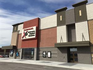 An XD Extreme Digital Cinema sign on the south side of the building.  The exit door from the main hallway is on the right. - , Utah