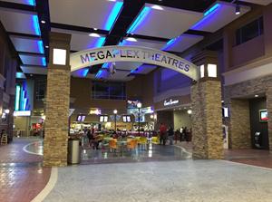 The theater entrance from inside the mall features the name, Megaplex Theatres, arcing between to pillars. - , Utah