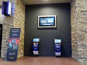 A pair of ticketing kiosks, sponsered by America First Credit Union, in the main lobby. - , Utah