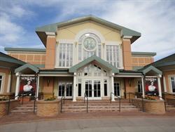 The theater entrance, with peaked roofs, glass windows, and planter boxes. - , Utah