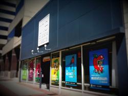 Posters for six productions hang in the windows along the front of the theater. - , Utah