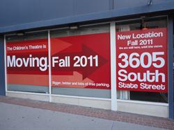 A "Moving Fall 2011" banner in the window of the Children's Theatre. - , Utah