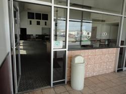 The two-window ticket booth and a view into the lobby. - , Utah