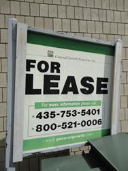 A For Lease sign along the south exterior wall. - , Utah