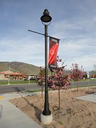 A lamp post with a banner for the CenterPoint Theatre at the Davis Center for the Performing Arts. - , Utah