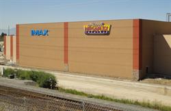 The exterior walls of the two largest auditoriums bear signs for IMAX and Megaplex Theatres. - , Utah