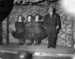 A man and three women stand on the stage. - , Utah